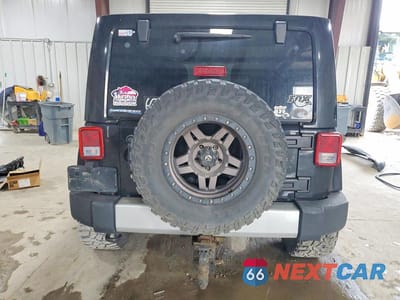 Zdjęcie 6 z 13 samochodu: 2012 JEEP WRANGLER UNLIMITED SAHARA VIN:1C4BJWEG6CL191585 - miniatura