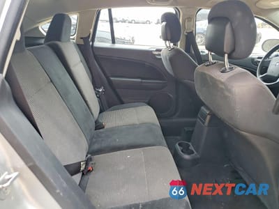 Zdjęcie 10 z 13 samochodu: 2011 DODGE CALIBER MAINSTREET VIN:1B3CB3HA6BD269364 - miniatura