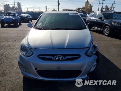 Piąte zdjęcie samochodu w środku: 2014 HYUNDAI ACCENT GLS VIN:KMHCU4AEXEU747135 - miniatura