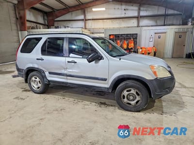 Czwarte zdjęcie samochodu z boku: 2003 HONDA CR-V LX VIN:SHSRD68453U102771 - miniatura