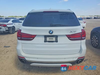 Zdjęcie 6 z 13 samochodu: 2014 BMW X5 SDRIVE35I VIN:5UXKR2C53E0C01272 - miniatura