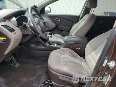 Zdjęcie 7 z 14 samochodu: 2014 HYUNDAI TUCSON GLS VIN:KM8JTCAFXEU938938 - miniatura