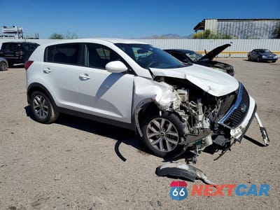 Czwarte zdjęcie samochodu z boku: 2016 KIA SPORTAGE LX VIN:KNDPB3AC8G7872639 - miniatura
