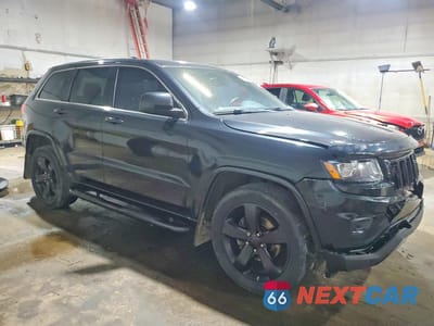 Czwarte zdjęcie samochodu z boku: 2015 JEEP GRAND CHEROKEE LAREDO VIN:1C4RJFAG8FC643402 - miniatura