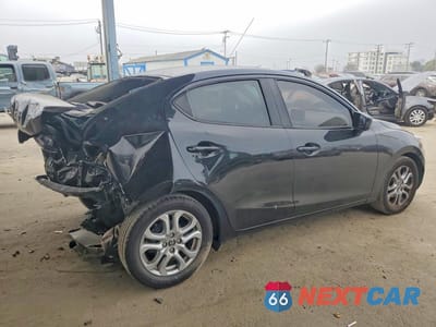 Trzecie zdjęcie samochodu z tyłu: 2017 TOYOTA YARIS IA BASE VIN:3MYDLBYV4HY160549 - miniatura