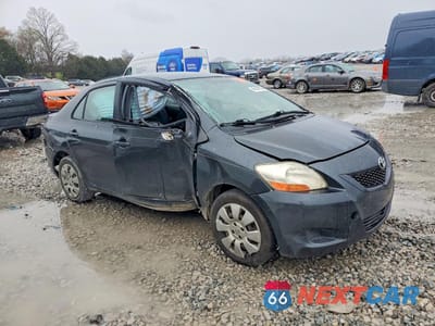 Czwarte zdjęcie samochodu z boku: 2009 TOYOTA YARIS BASE VIN:JTDBT903691331056 - miniatura