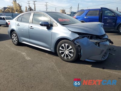 Czwarte zdjęcie samochodu z boku: 2022 TOYOTA COROLLA HYBRID LE VIN:JTDEAMDE4NJ052796 - miniatura