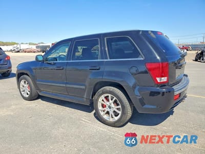 Drugie zdjęcie samochodu z przodu: 2010 JEEP GRAND CHEROKEE SRT-8 VIN:1J4RR7GW3AC105674 - miniatura