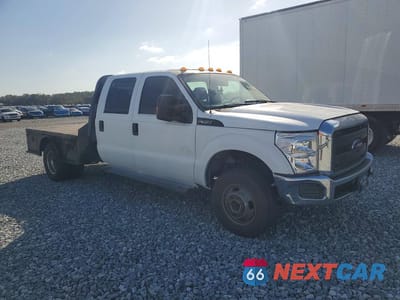 Czwarte zdjęcie samochodu z boku: 2016 FORD F350 SUPER DUTY FLATBED TRUCK VIN:1FD8W3HT4GEC90463 - miniatura