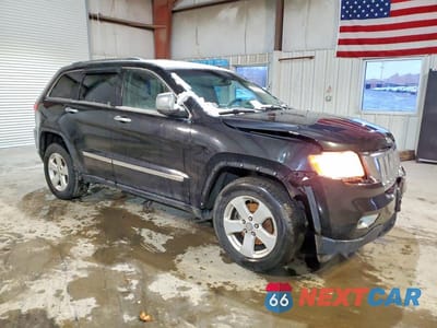 Czwarte zdjęcie samochodu z boku: 2012 JEEP GRAND CHEROKEE LAREDO VIN:1C4RJFAG0CC245368 - miniatura