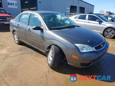 Czwarte zdjęcie samochodu z boku: 2007 FORD FOCUS ZX4 VIN:1FAHP34NX7W344633 - miniatura