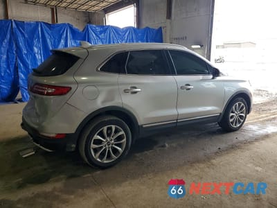 Trzecie zdjęcie samochodu z tyłu: 2018 LINCOLN MKZ VIN:5LMCJ2D97JUL21079 - miniatura