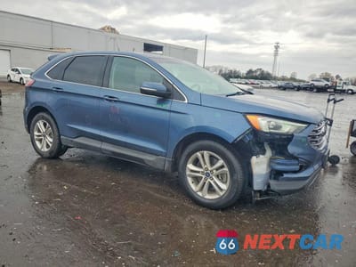 Czwarte zdjęcie samochodu z boku: 2019 FORD EDGE SEL VIN:2FMPK4J92KBB79300 - miniatura