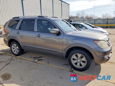 Czwarte zdjęcie samochodu z boku: 2009 KIA BORREGO LX VIN:KNDJJ741495016862 - miniatura