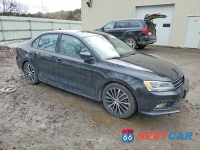 Czwarte zdjęcie samochodu z boku: 2015 VOLKSWAGEN JETTA SE VIN:3VWD17AJ3FM205006 - miniatura