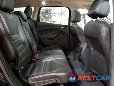 Zdjęcie 11 z 13 samochodu: 2017 FORD ESCAPE TITANIUM VIN:1FMCU9J95HUB80739 - miniatura