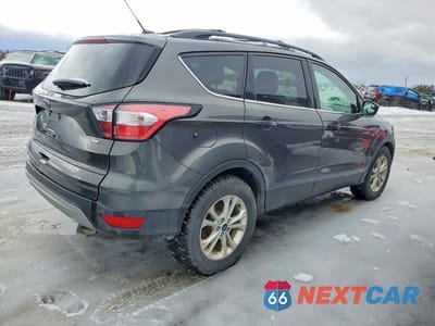 Trzecie zdjęcie samochodu z tyłu: 2017 FORD ESCAPE SE VIN:1FMCU9GD7HUD31379 - miniatura