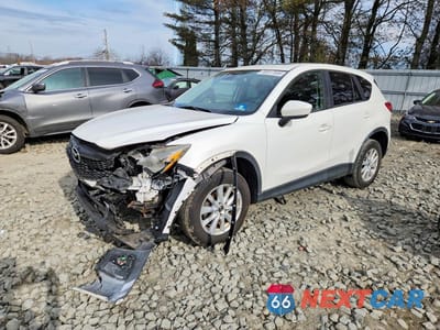 2014 MAZDA CX-5 TOURING JM3KE4CY9E0330835 - główne zdjęcie licytacji z USA - miniatura
