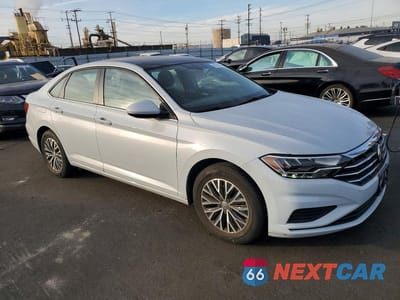 Czwarte zdjęcie samochodu z boku: 2019 VOLKSWAGEN JETTA S VIN:3VWC57BU4KM117178 - miniatura