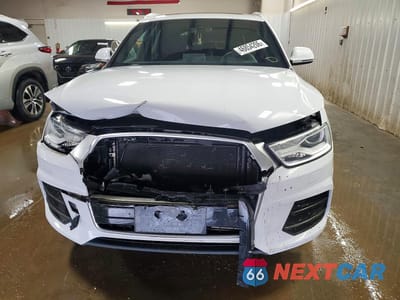 Piąte zdjęcie samochodu w środku: 2016 AUDI Q3 PREMIUM PLUS VIN:WA1EFCFS5GR013017 - miniatura