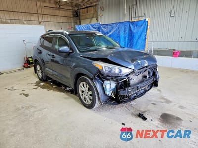 Czwarte zdjęcie samochodu z boku: 2019 HYUNDAI TUCSON VALUE VIN:KM8J3CA4XKU882140 - miniatura