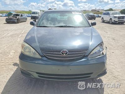 Piąte zdjęcie samochodu w środku: 2002 TOYOTA CAMRY VIN:4T1BE32K32U611979 - miniatura