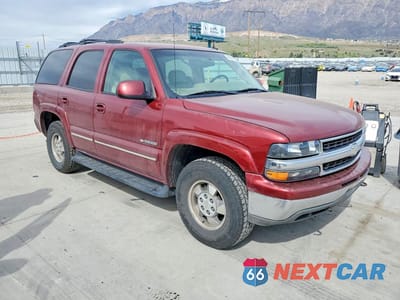 Czwarte zdjęcie samochodu z boku: 2002 CHEVROLET TAHOE K1500 VIN:1GNEK13Z92J343653 - miniatura