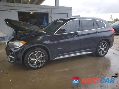 2018 BMW X1 XDRIVE28I WBXHT3C3XJ5K22635 - główne zdjęcie licytacji z USA - miniatura