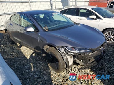 Czwarte zdjęcie samochodu z boku: 2024 TESLA MODEL 3 VIN:5YJ3E1EA0RF863692 - miniatura