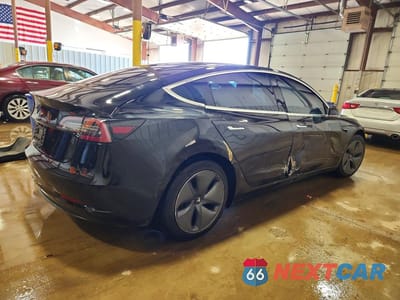 Trzecie zdjęcie samochodu z tyłu: 2020 TESLA MODEL 3 VIN:5YJ3E1EA0LF792131 - miniatura