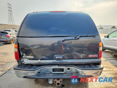 Zdjęcie 6 z 13 samochodu: 2003 GMC YUKON VIN:1GKEC13V43R281301 - miniatura