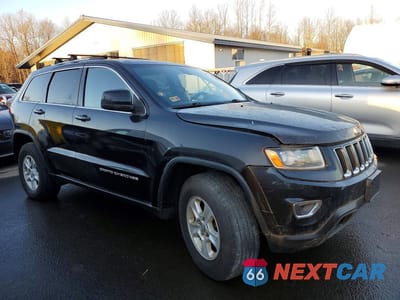 Czwarte zdjęcie samochodu z boku: 2015 JEEP GRAND CHEROKEE LAREDO VIN:1C4RJFAG0FC812683 - miniatura