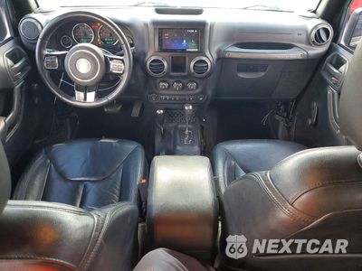 Zdjęcie 8 z 13 samochodu: 2015 JEEP WRANGLER UNLIMITED SAHARA VIN:1C4BJWEG1FL707887 - miniatura