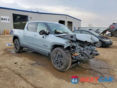 Czwarte zdjęcie samochodu z boku: 2025 RIVIAN R1T ADVENTURE VIN:7FCTGBAA0SN040168 - miniatura