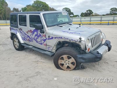 Czwarte zdjęcie samochodu z boku: 2012 JEEP WRANGLER UNLIMITED SAHARA VIN:1C4BJWEG5CL190296 - miniatura