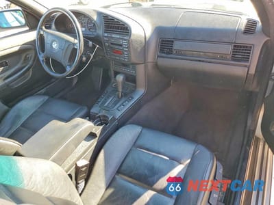 Zdjęcie 8 z 11 samochodu: 1998 BMW 323 IC AUTOMATIC VIN:WBABJ8322WEM21289 - miniatura