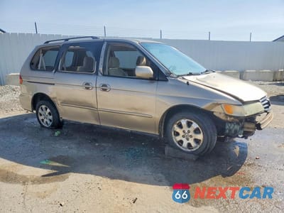 Czwarte zdjęcie samochodu z boku: 2002 HONDA ODYSSEY EX VIN:5FNRL18602B021819 - miniatura