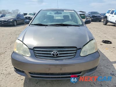 Piąte zdjęcie samochodu w środku: 2003 TOYOTA COROLLA CE VIN:1NXBR32E73Z125546 - miniatura