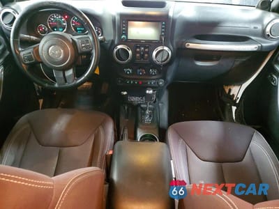 Zdjęcie 8 z 11 samochodu: 2013 JEEP WRANGLER UNLIMITED SAHARA VIN:1C4BJWEG3DL539148 - miniatura