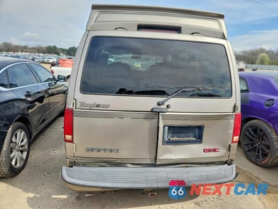 Zdjęcie 6 z 13 samochodu: 2001 GMC SAFARI VIN:1GDDM19W31B521640 - miniatura