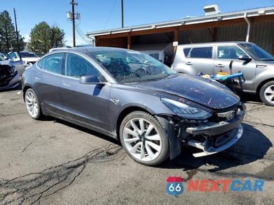 Czwarte zdjęcie samochodu z boku: 2020 TESLA MODEL 3 VIN:5YJ3E1EB3LF619941 - miniatura