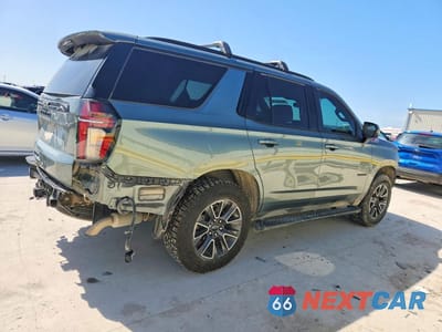 Trzecie zdjęcie samochodu z tyłu: 2024 CHEVROLET TAHOE K1500 Z71 VIN:1GNSKPKD7RR304440 - miniatura