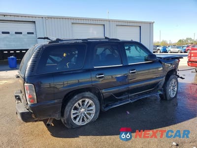 Trzecie zdjęcie samochodu z tyłu: 2003 GMC YUKON DENALI VIN:1GKEK63U93J289318 - miniatura