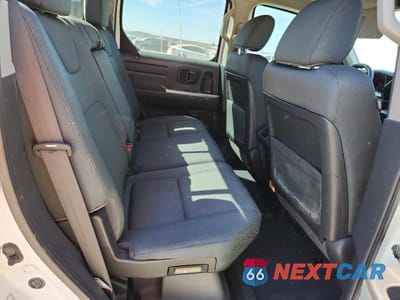Zdjęcie 10 z 12 samochodu: 2013 HONDA RIDGELINE SPORT VIN:5FPYK1F73DB012245 - miniatura