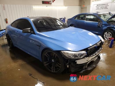 Czwarte zdjęcie samochodu z boku: 2015 BMW M4 VIN:WBS3R9C50FK330922 - miniatura