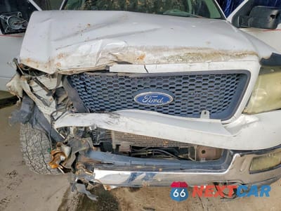 Zdjęcie 11 z 12 samochodu: 2004 FORD F150 VIN:1FTPX14544NB93672 - miniatura