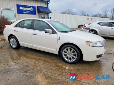 Czwarte zdjęcie samochodu z boku: 2012 LINCOLN MKZ VIN:3LNHL2GC6CR802817 - miniatura