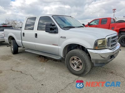 Czwarte zdjęcie samochodu z boku: 2004 FORD F250 SUPER DUTY VIN:1FTNW21P84ED31994 - miniatura