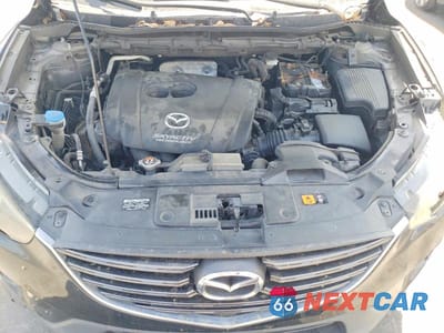 Zdjęcie 12 z 12 samochodu: 2016 MAZDA CX-5 TOURING VIN:JM3KE2CY1G0619313 - miniatura
