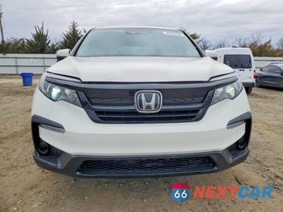 Piąte zdjęcie samochodu w środku: 2019 HONDA PILOT LX VIN:5FNYF6H19KB086298 - miniatura